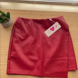 Tight red leather skirt